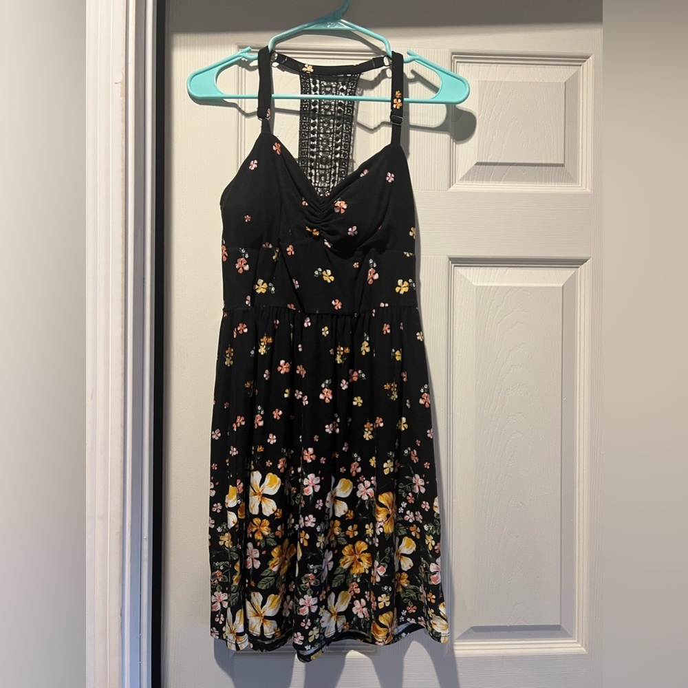 A black flower sun dress